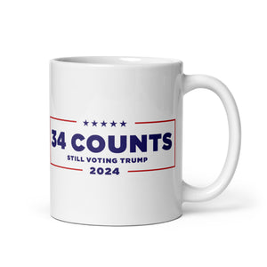 34 Counts Still Voting for Trump mug