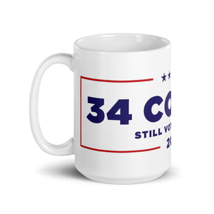 34 Counts Still Voting for Trump mug